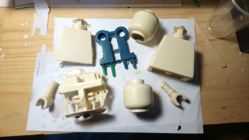 lego minifigure parts cast in silicone with flashing and sprues